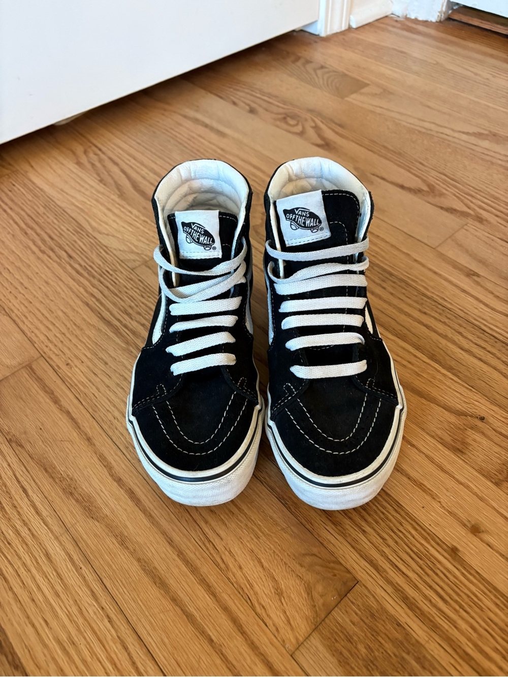 Vans High-top sneakers in black & white.